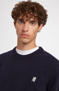 Round Neck Lambswool Golf Jumper In Navy showing embroidery - Pringle of Scotland