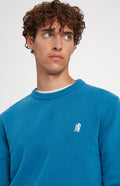 Round Neck Lambswool Golf Jumper In Lagoon neck detail - Pringle of Scotland