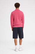 Round Neck Lambswool Golf Jumper In Heather Pink on model rear view - Pringle of Scotland