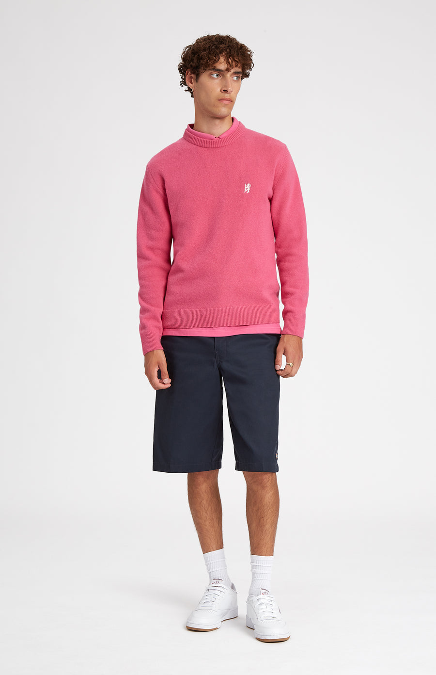 Round Neck Lambswool Golf Jumper In Heather Pink on male model full length - Pringle of Scotland