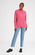 Round Neck Lambswool Golf Jumper In Heather Pink on female model full length - Pringle of Scotland