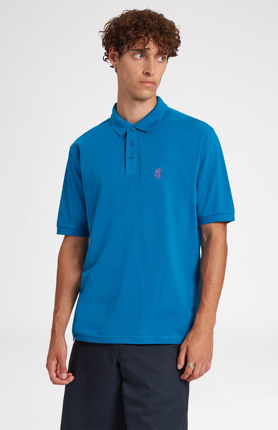 Cotton Heritage Golf Polo Shirt In Lagoon on male model - Pringle of Scotland