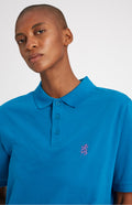 Cotton Heritage Golf Polo Shirt In Lagoon on a woman neck detail - Pringle of Scotland