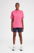 Cotton Heritage Golf Polo Shirt In Heather Pink on female model full length - Pringle of Scotland