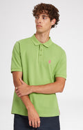 Cotton Heritage Golf Polo Shirt In Field Green on a man - Pringle of Scotland