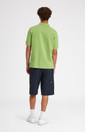 Cotton Heritage Golf Polo Shirt In Field Green on male model rear view - Pringle of Scotland