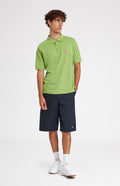Cotton Heritage Golf Polo Shirt In Field Green on male model - Pringle of Scotland