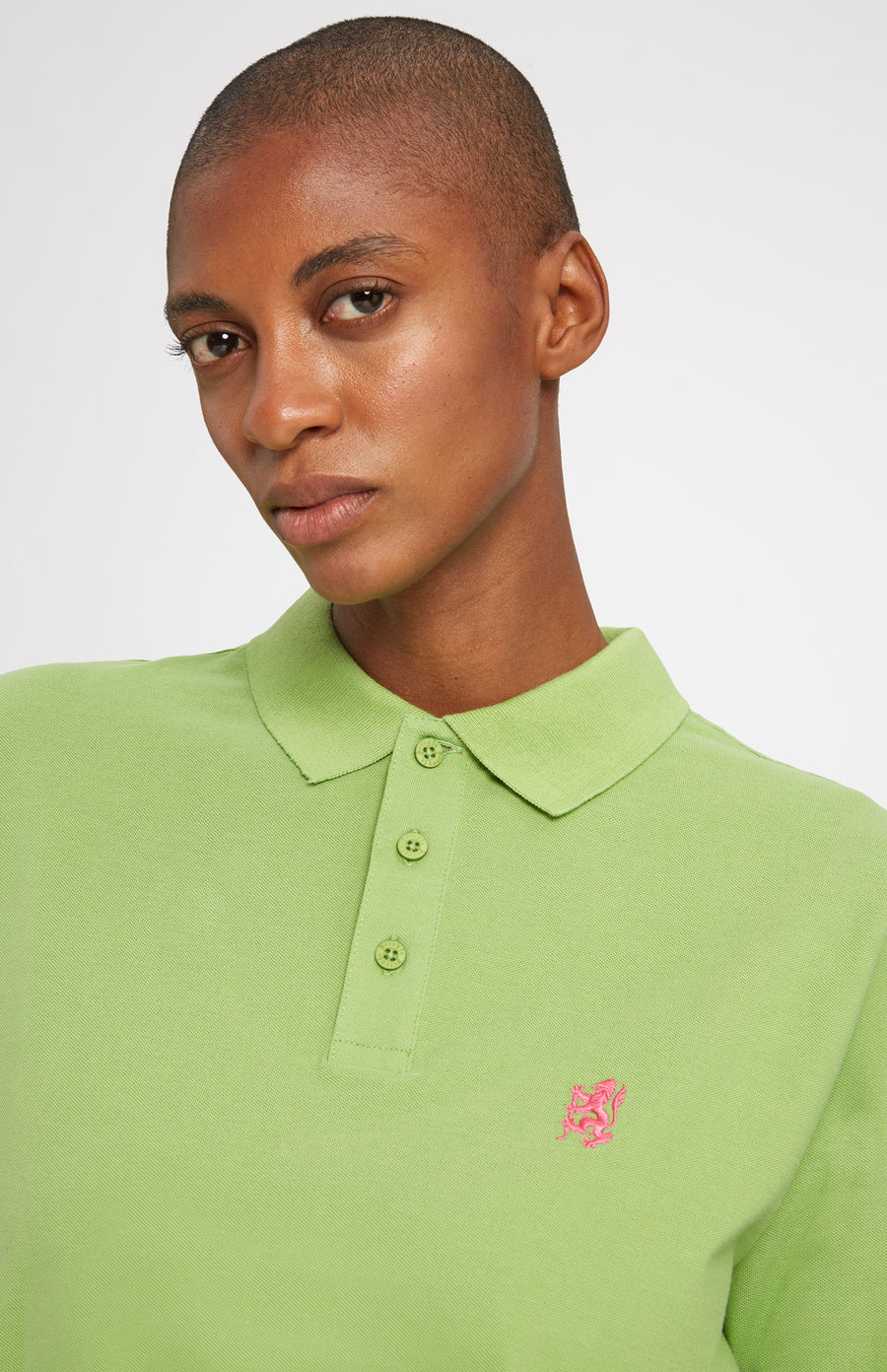 Cotton Heritage Golf Polo Shirt In Field Green on female model neck detail - Pringle of Scotland