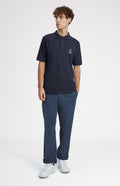 Geometric George Golf Cotton Polo Shirt In Navy on model full length - Pringle of Scotland