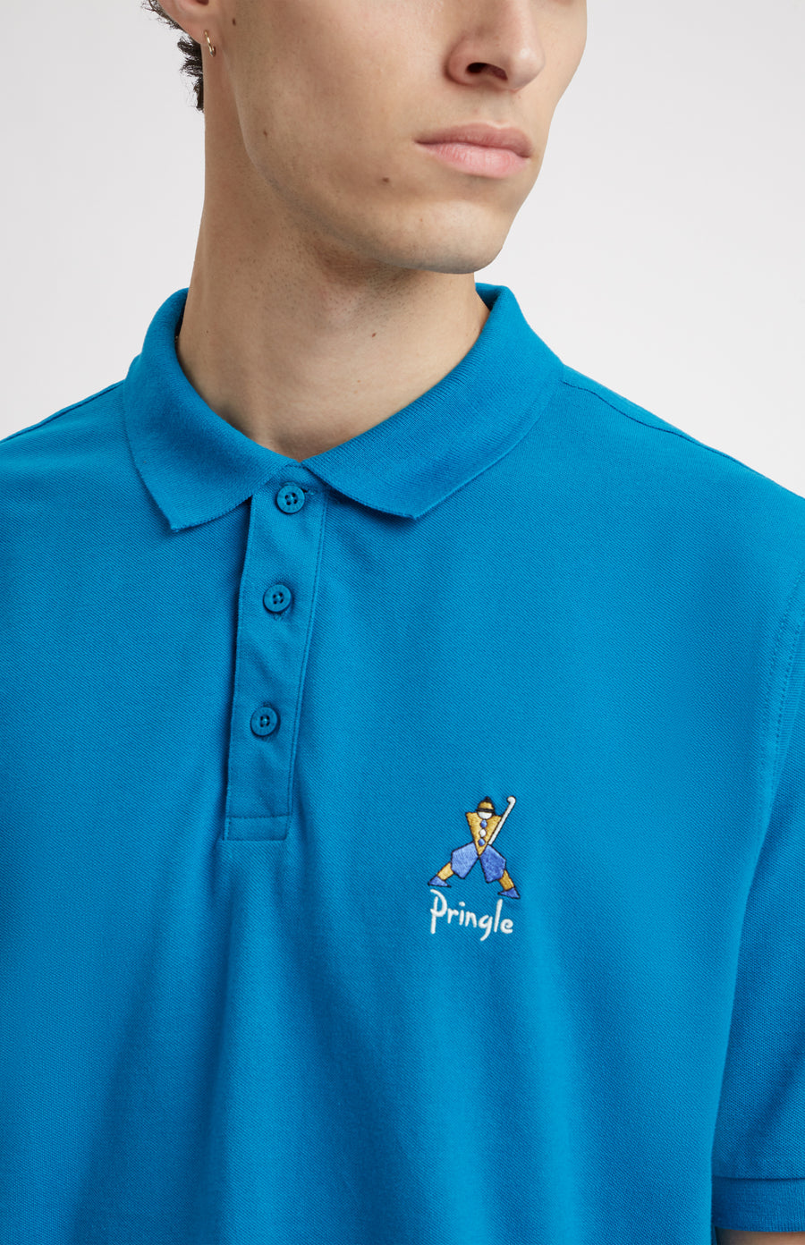 Geometric George Golf Cotton Polo Shirt In Lagoon neck detail - Pringle of Scotland