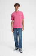 Geometric George Golf Cotton Polo Shirt In Heather Pink on model full length - Pringle of Scotland