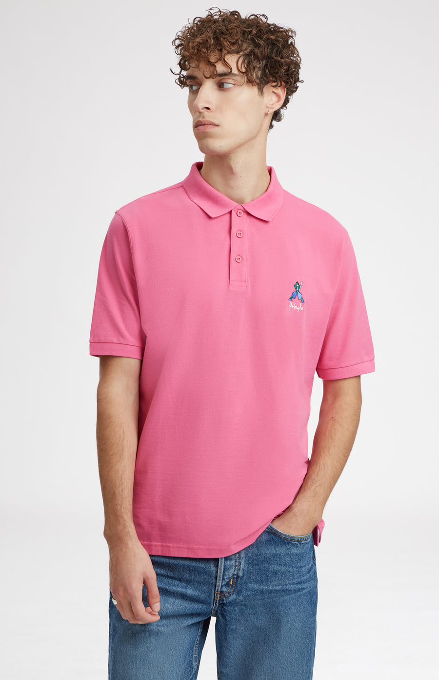 Geometric George Golf Cotton Polo Shirt In Heather Pink on model - Pringle of Scotland