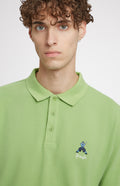 Geometric George Golf Cotton Polo Shirt In Field Green neck detail - Pringle of Scotland
