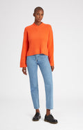 Cosy Cashmere Jumper In Apricot Orange on female model full length - Pringle of Scotland