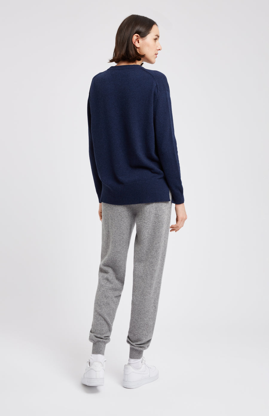 Women's Round Neck Cashmere Jumper In Inkwell Blue on model rear shot - Pringle of Scotland