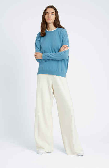 Round Neck Cashmere Jumper In Blue Smoke on model full length - Pringle of Scotland