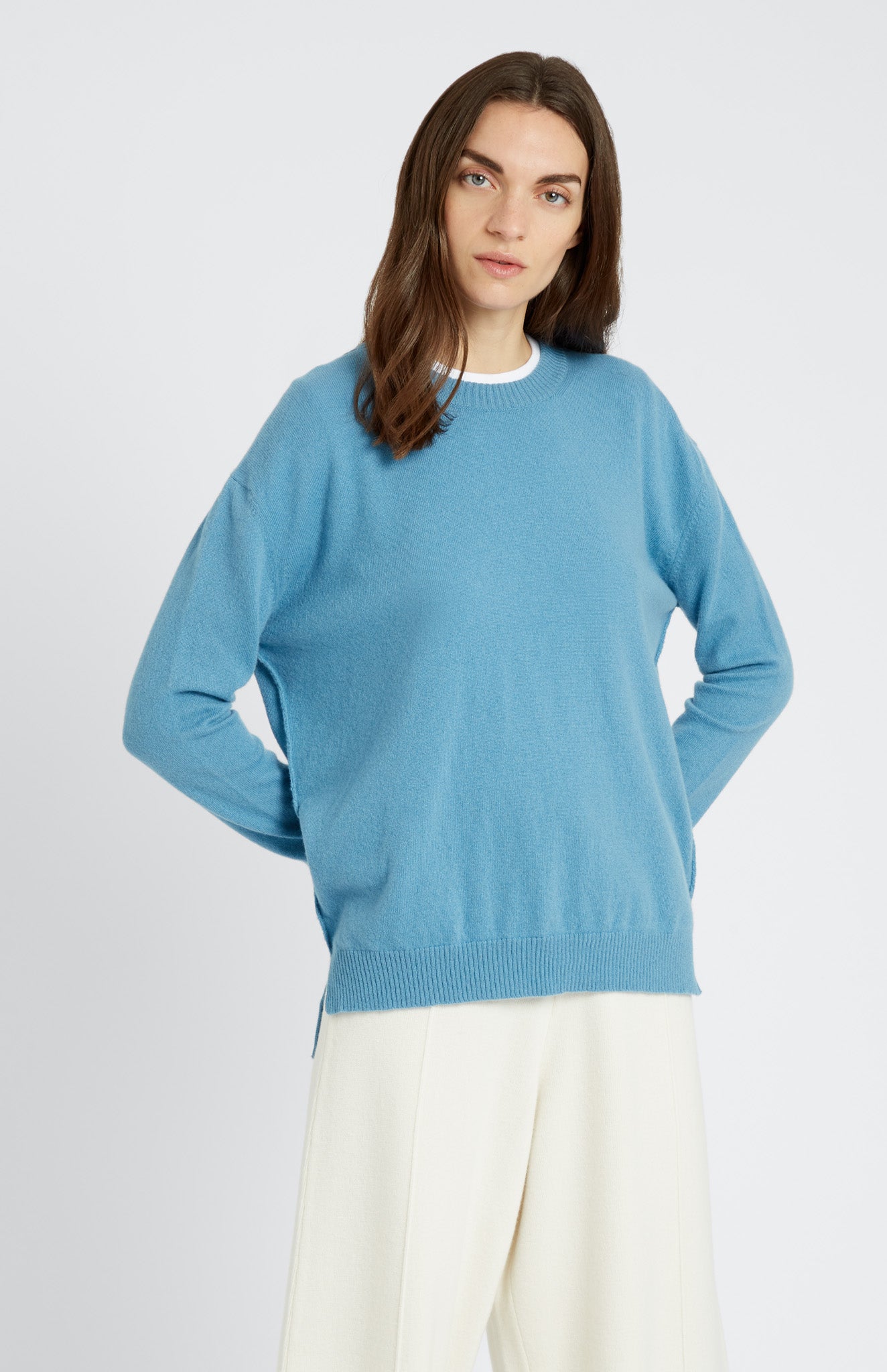 Round Neck Cashmere Jumper In Blue Smoke on model - Pringle of Scotland